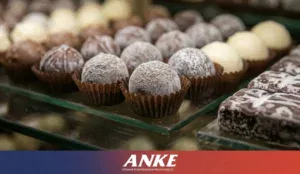 Chocolate bloom on truffles in a commercial chocolate display cabinet caused by poor temperature and humidity control